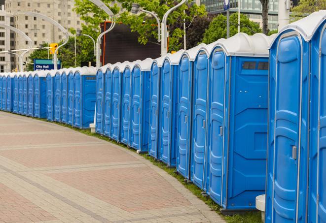 a row of portable restrooms set up for a special event, providing guests with a comfortable and sanitary option in Fort Lauderdale